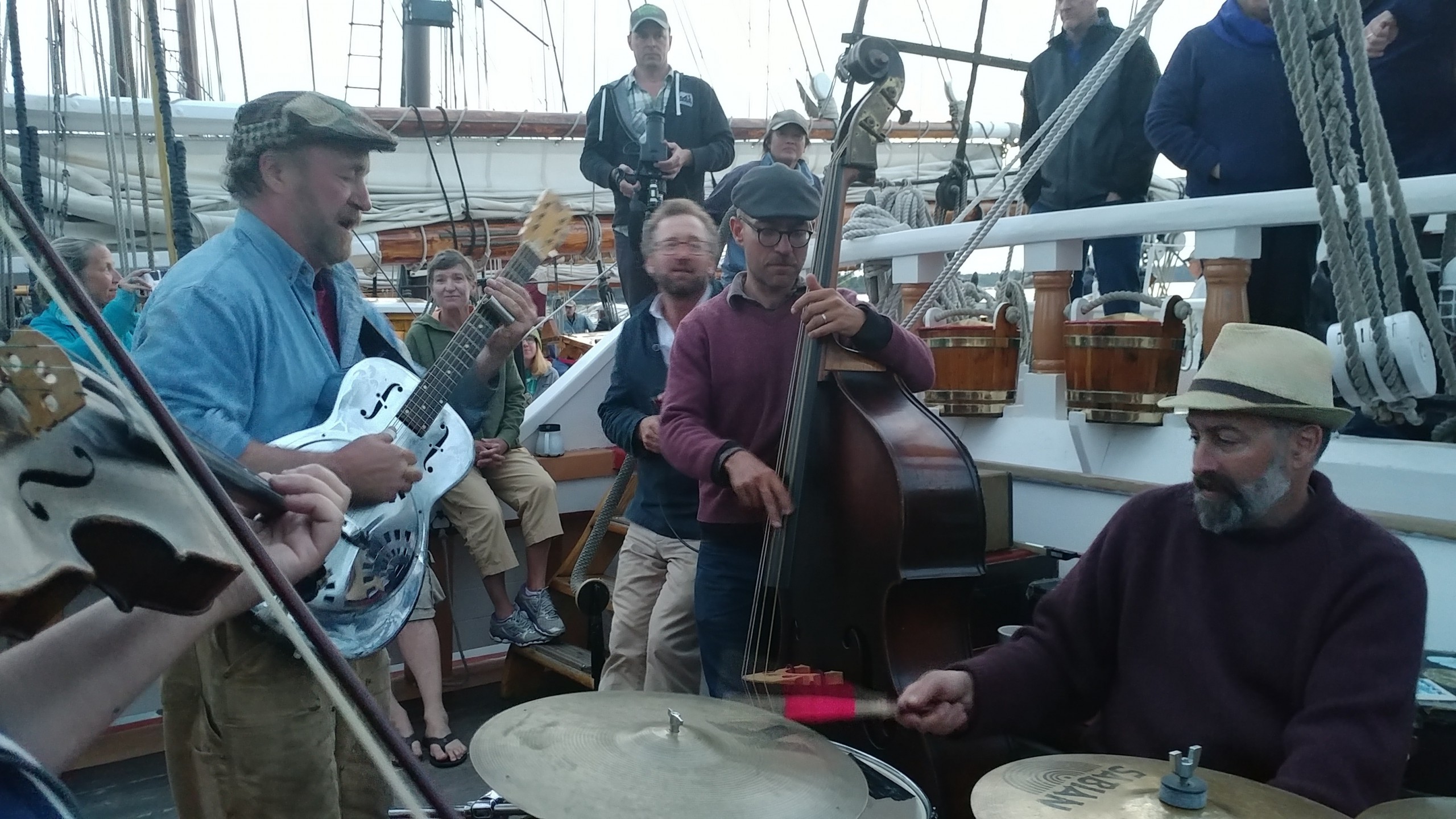 Captains and crew gather on the Victory Chimes for a jam session. 