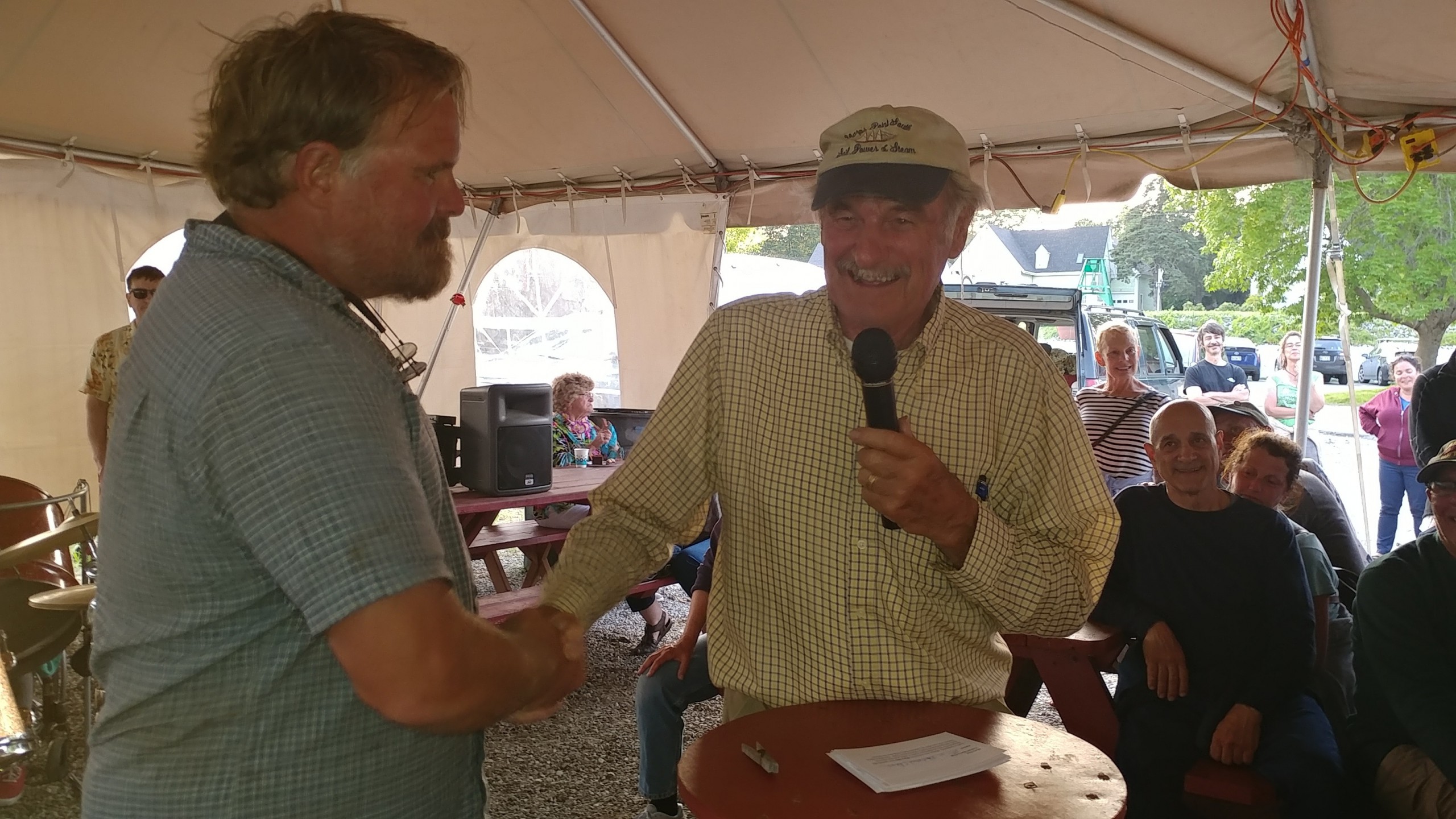 Captain Jim Sharp congratulates Capt Barry King on his Great Schooner Race win