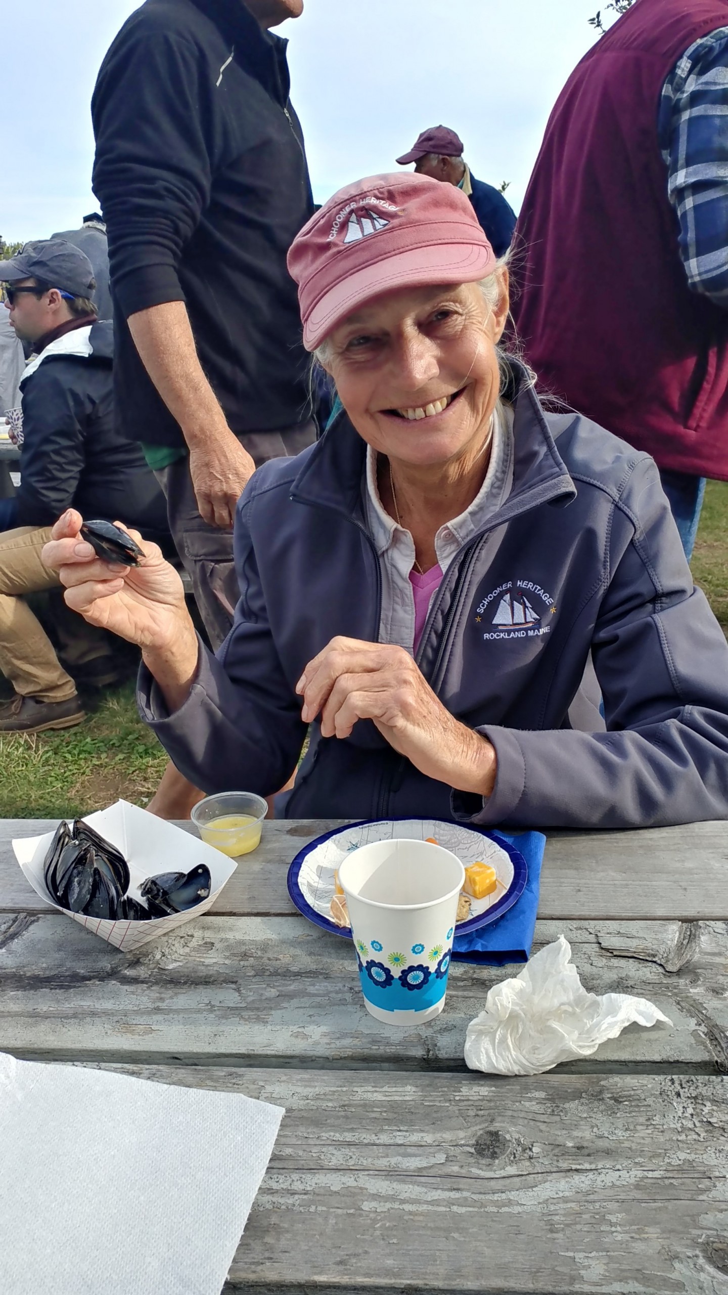 Captain Linda Lee enjoys steamed mussels at the WoodenBoat Sail In