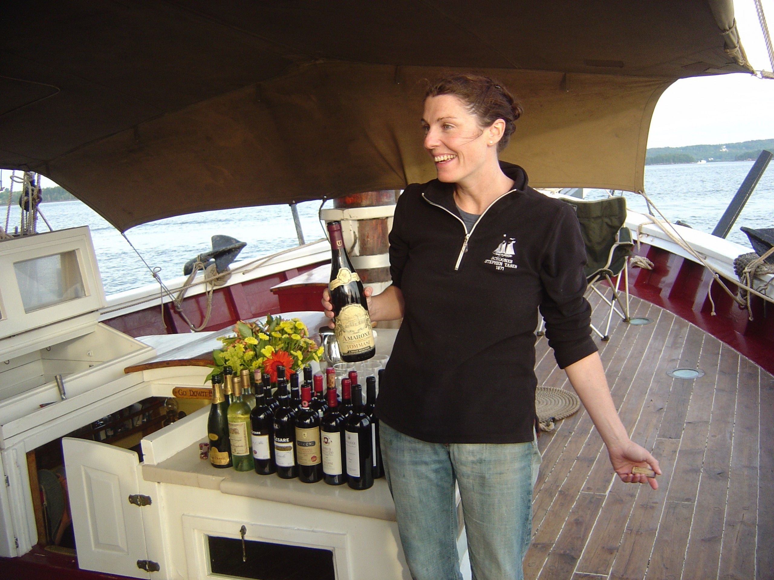 Jane Barrett Barnes on Schooner Stephen Taber during a wine tasting